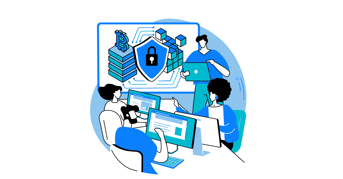 A group of people sitting at a table with computers