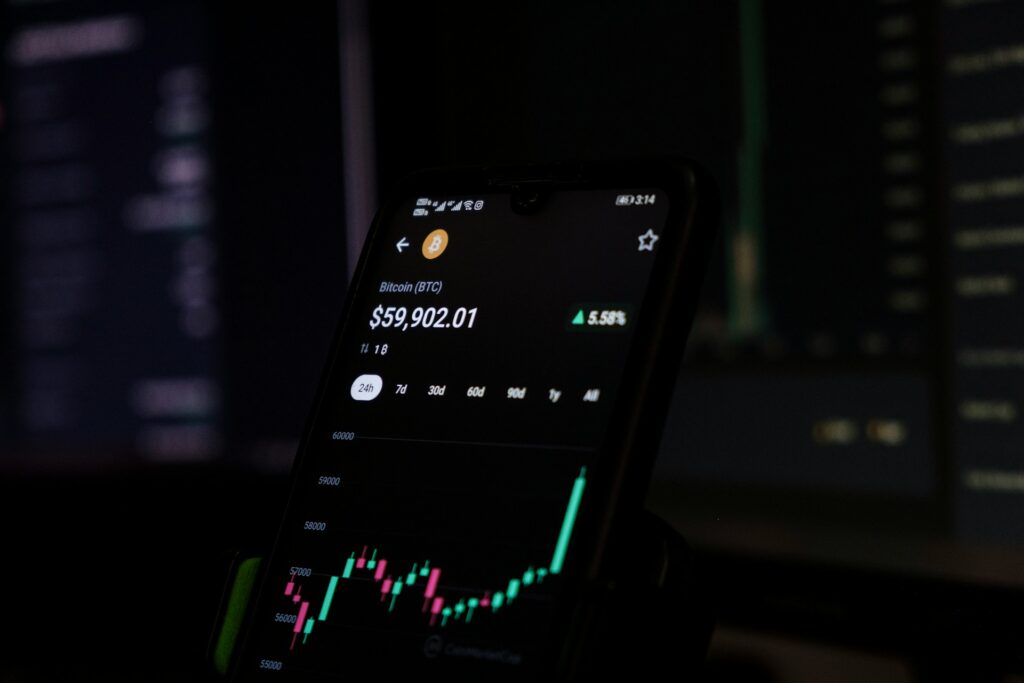 A smartphone display cryptocurrency trading data